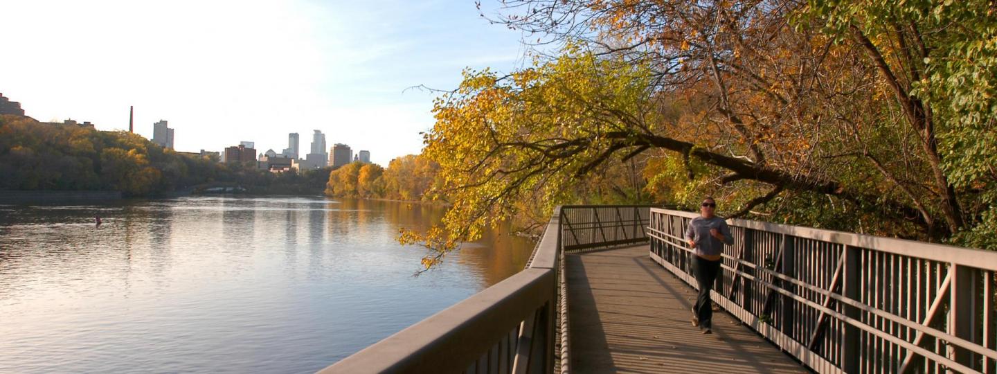 A view over the Mississippi River from the running trail looking toward the Minneapolis skyline